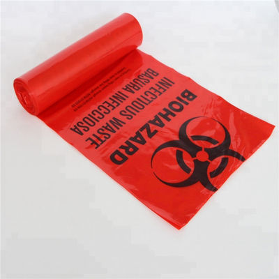 Uso en el hogar rojo plástico del oficio de enfermera del rollo del bolso de basura del Biohazard de 24 de los x 31in